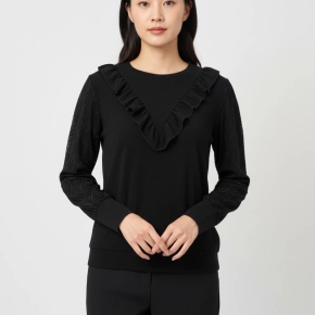 Zwarte glitter top met ruches en velvet mouwen