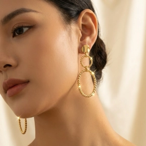 Dubbele ring oorbel met touwstructuur