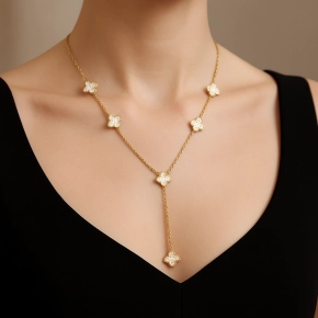 Goudkleurige stainless steel ketting met klaverdetails