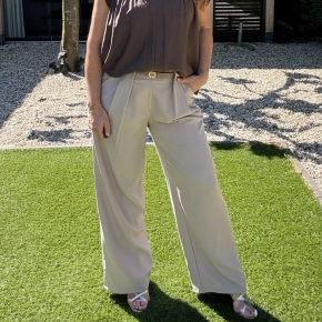 Beige pantalon brede riemlussen